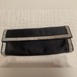 Stuart Weitzman Elegant Black Clutch with Silver Accents